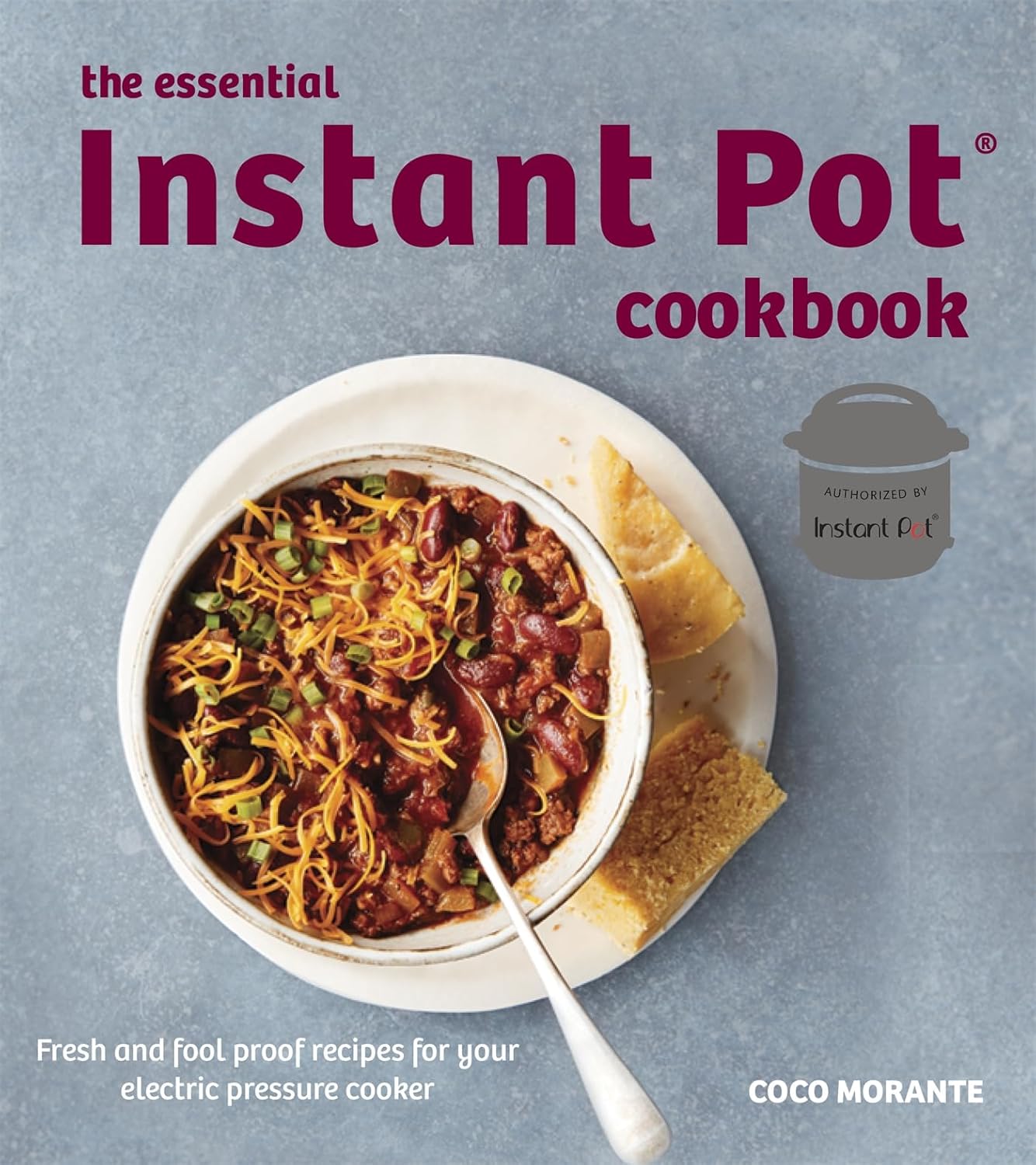 The Essential Instant Pot Cookbook by Coco Morante - Paperback cookbook cover with quick one-pot recipes for busy home cooks