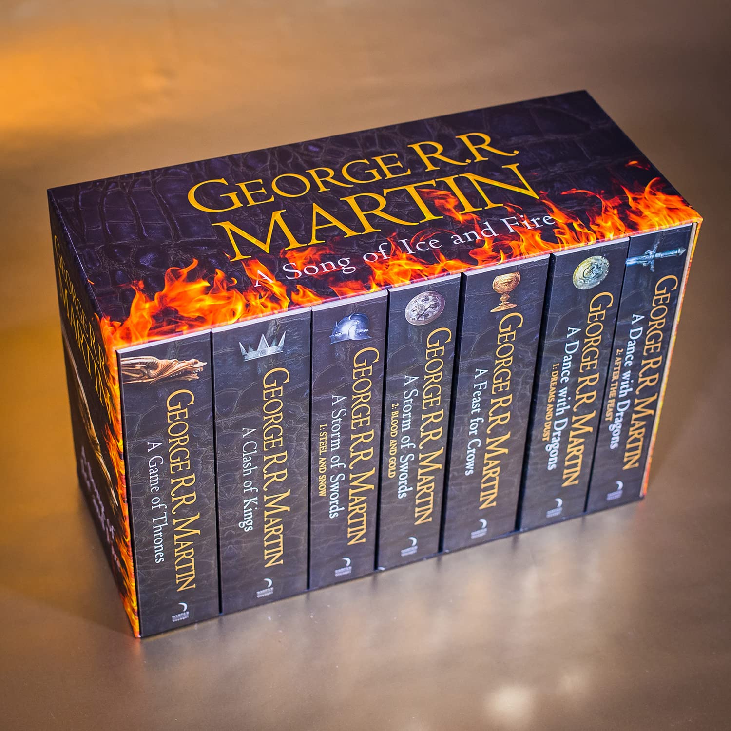 A Song of Ice and Fire 7 volume paperback set displayed on shelf