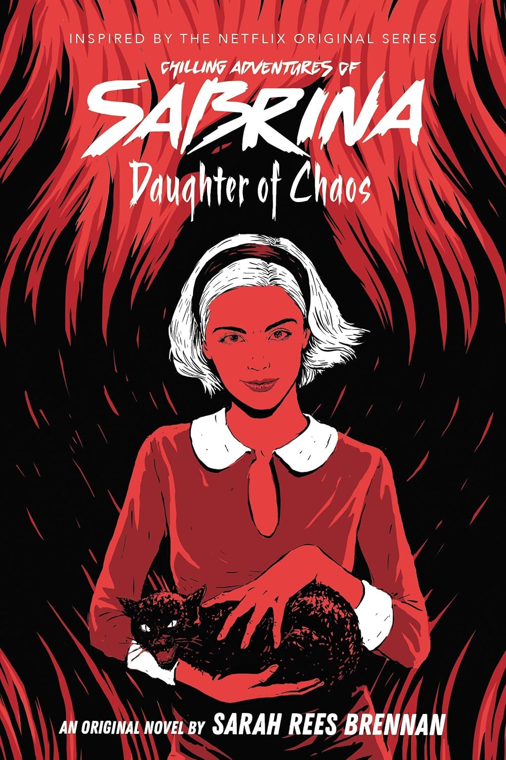 Stacked paperback spines of the Chilling Adventures of Sabrina trilogy by Sarah Rees Brennan, Young Adult book set