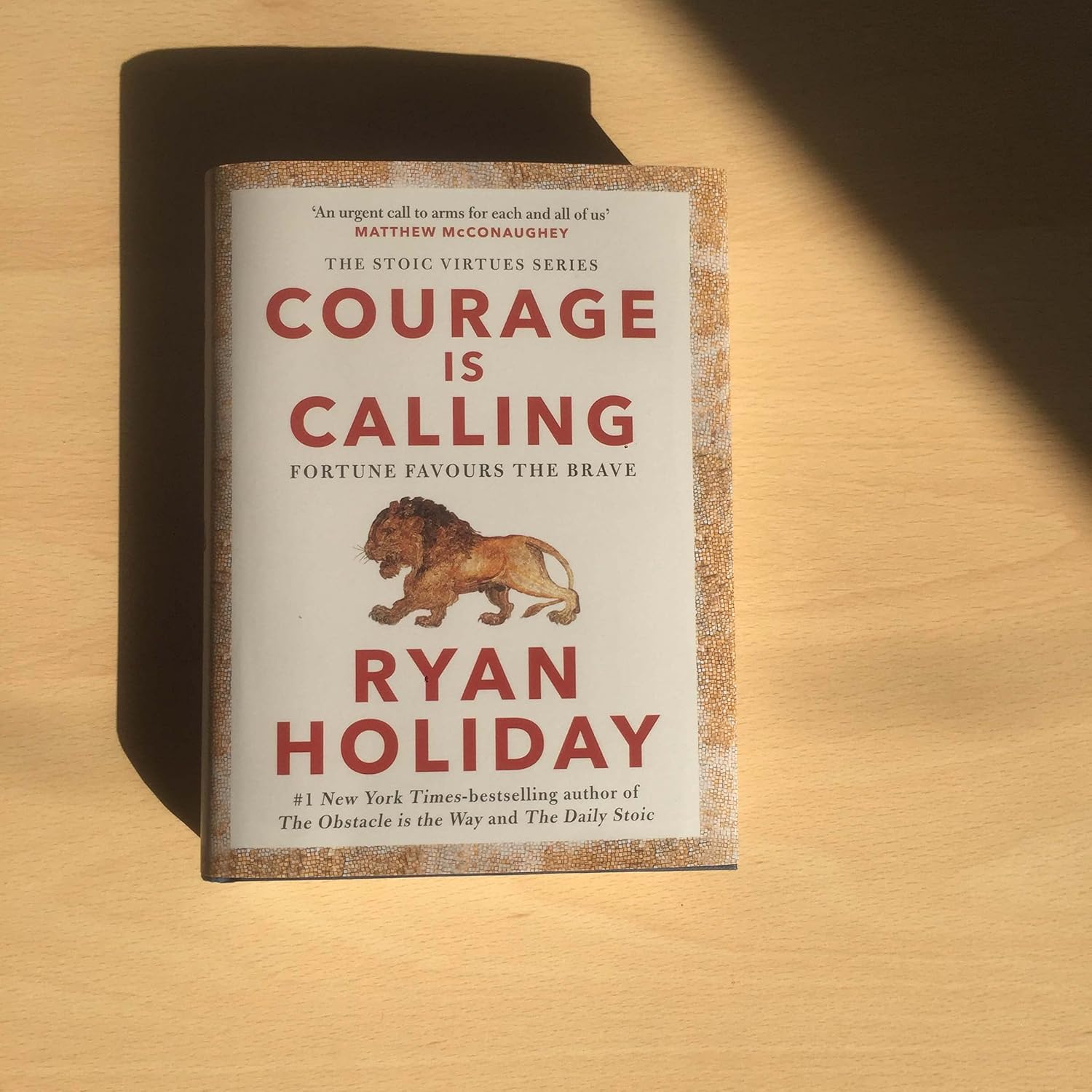 Courage Is Calling by Ryan Holiday hardback book, page detail from The Stoic Virtues Series