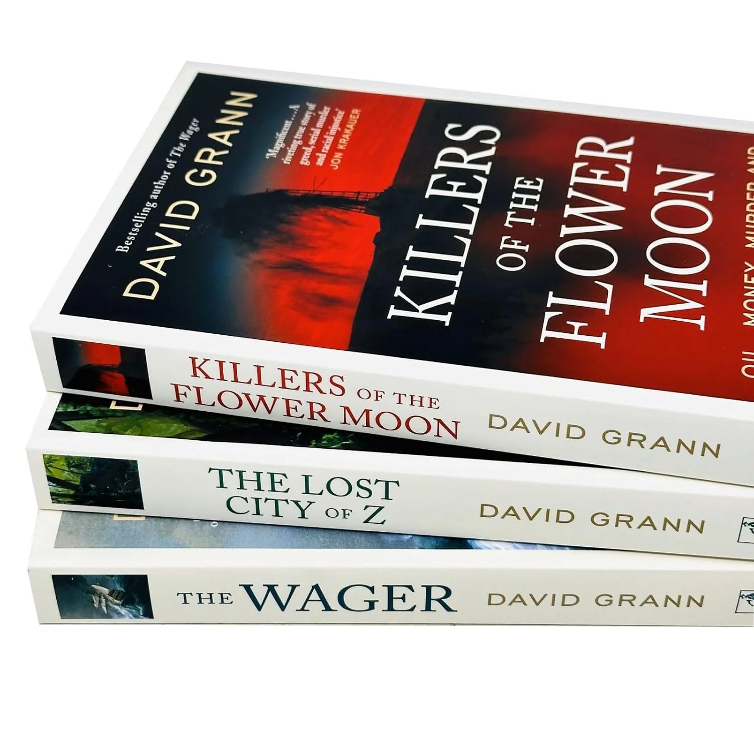 Paperback covers of David Grann true crime collection set including Killers of the Flower Moon and The Wager