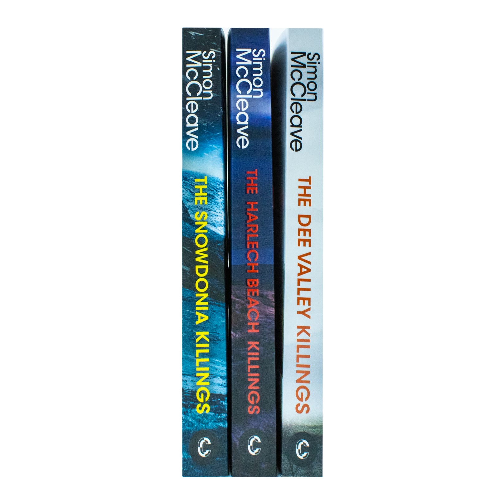 Close-up of The Snowdonia Killings, The Harlech Beach Killings and The Dee Valley Killings paperback books by Simon McCleave