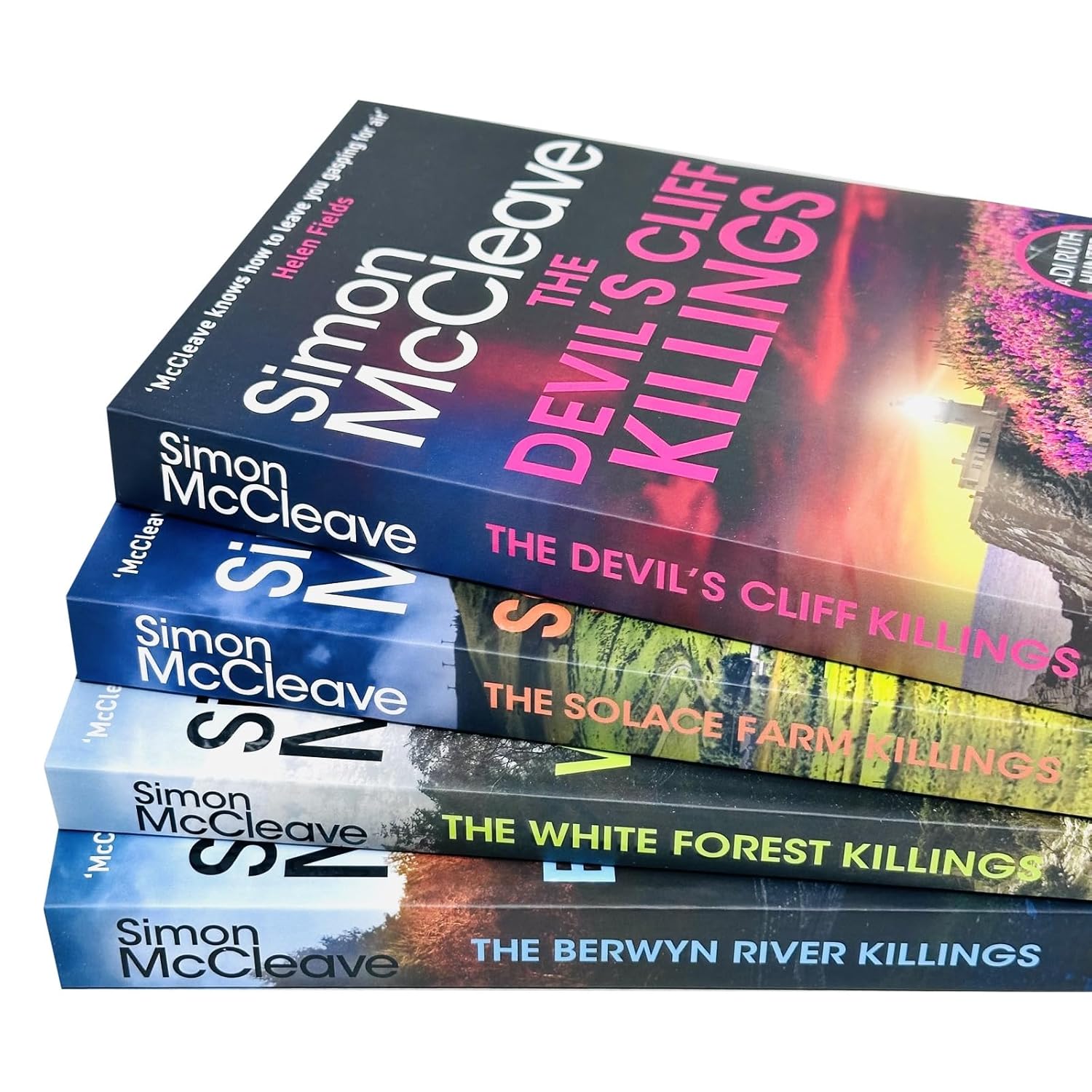 The White Forest Killings and Solace Farm Killings paperback covers by Simon McCleave