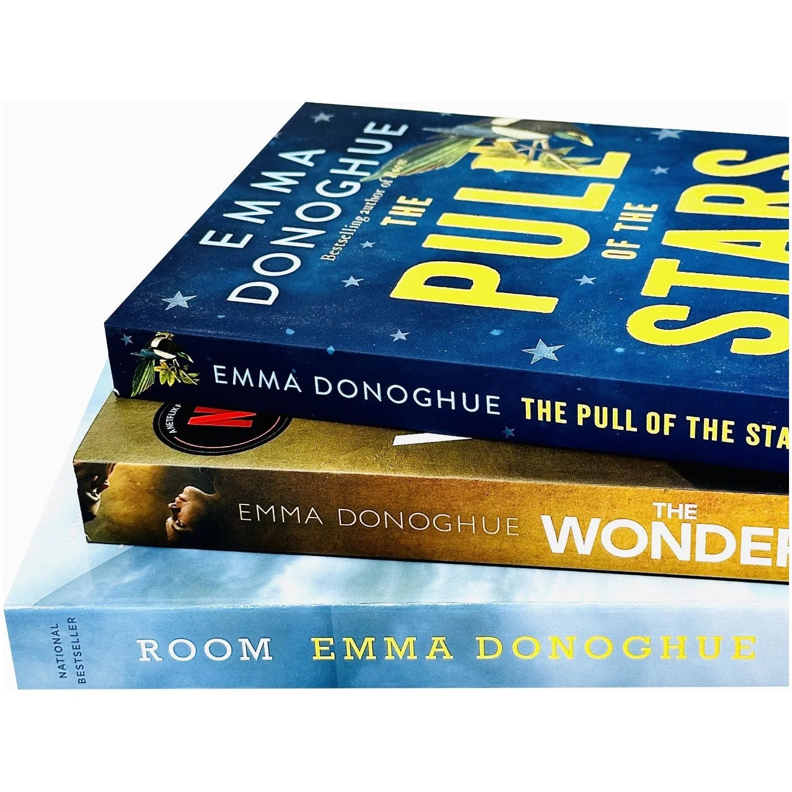 Close-up of Emma Donoghue 3 Books Collection Set paperback covers - The Pull of the Stars, The Wonder, Room