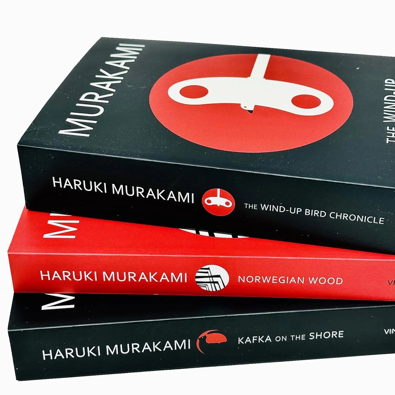 Haruki Murakami 3 Books Collection Set paperback - Norwegian Wood, Kafka on the Shore, The Wind-Up Bird Chronicle - close-up cover detail
