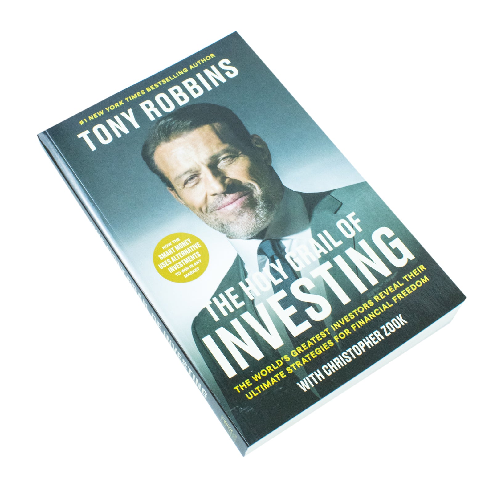 The Holy Grail of Investing by Tony Robbins and Christopher Zook - paperback book cover angle view