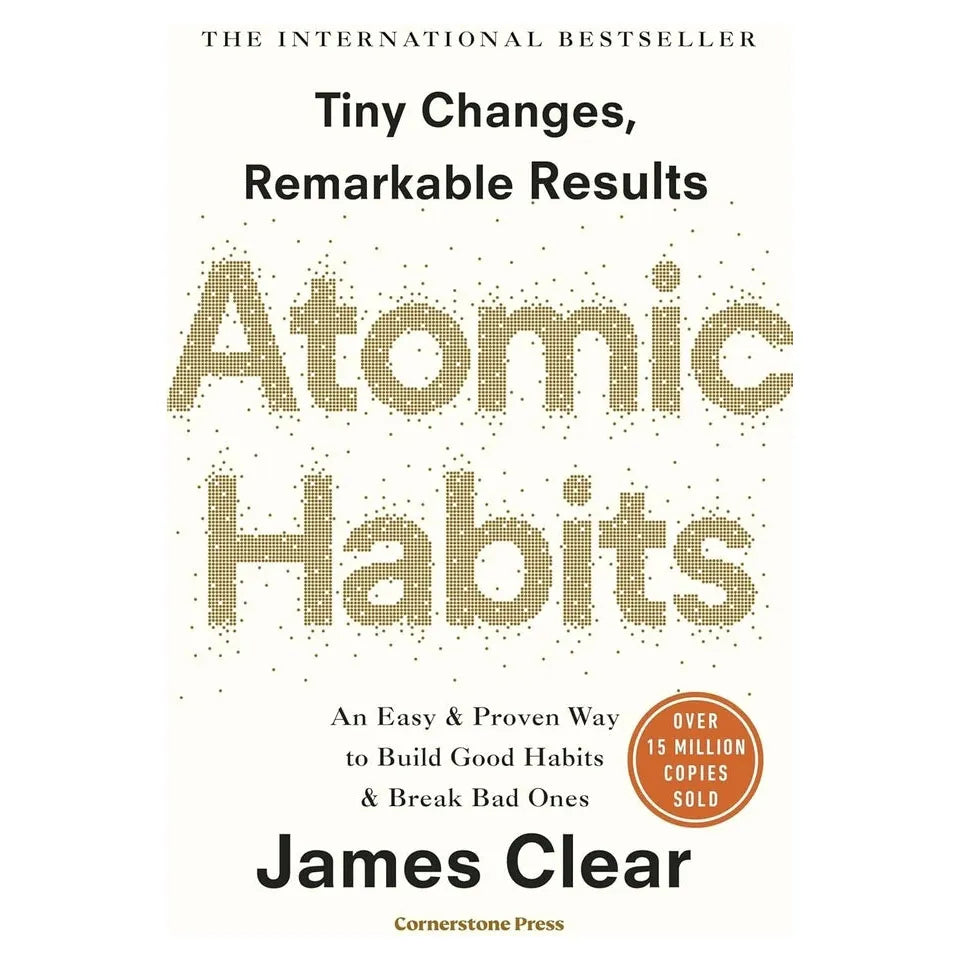 Close up of Atomic Habits and How To Talk To Anyone paperback books from the 3 book self-help collection set
