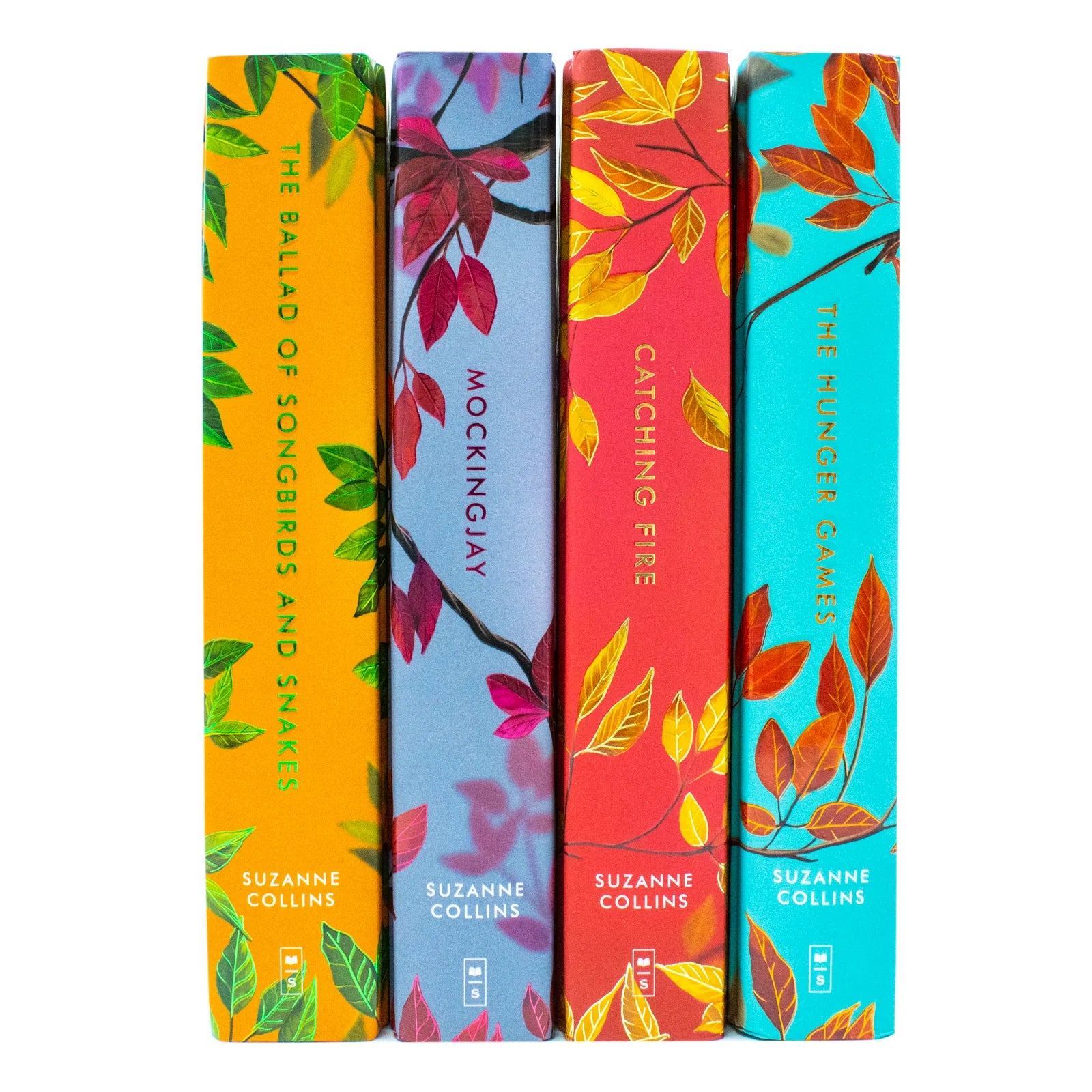 The Hunger Games Deluxe Collection stacked paperback books showing stencilled artwork on page edges