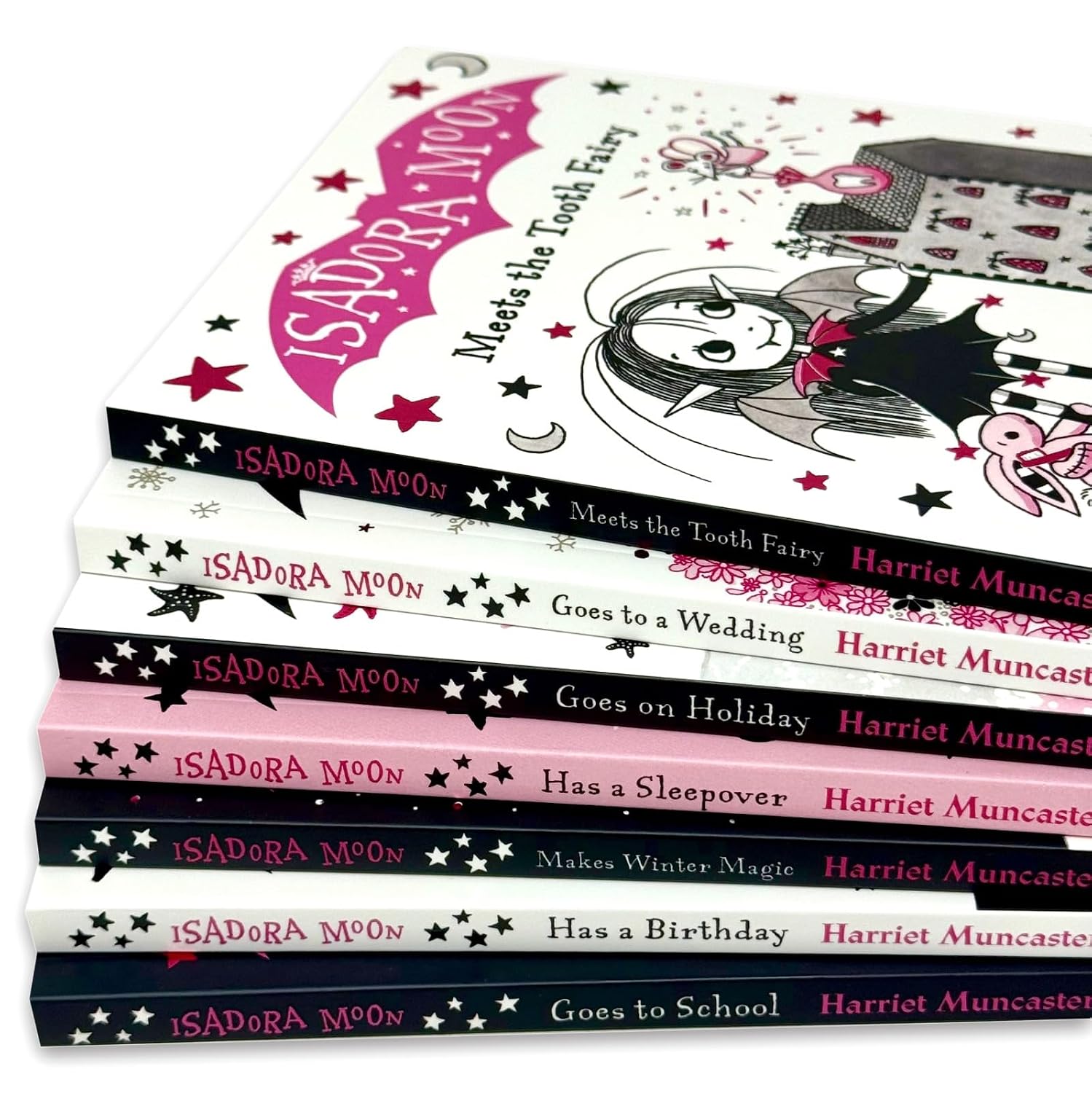 Isadora Moon paperback book set by Harriet Muncaster - Makes Winter Magic, Goes to School and Goes to a Wedding covers