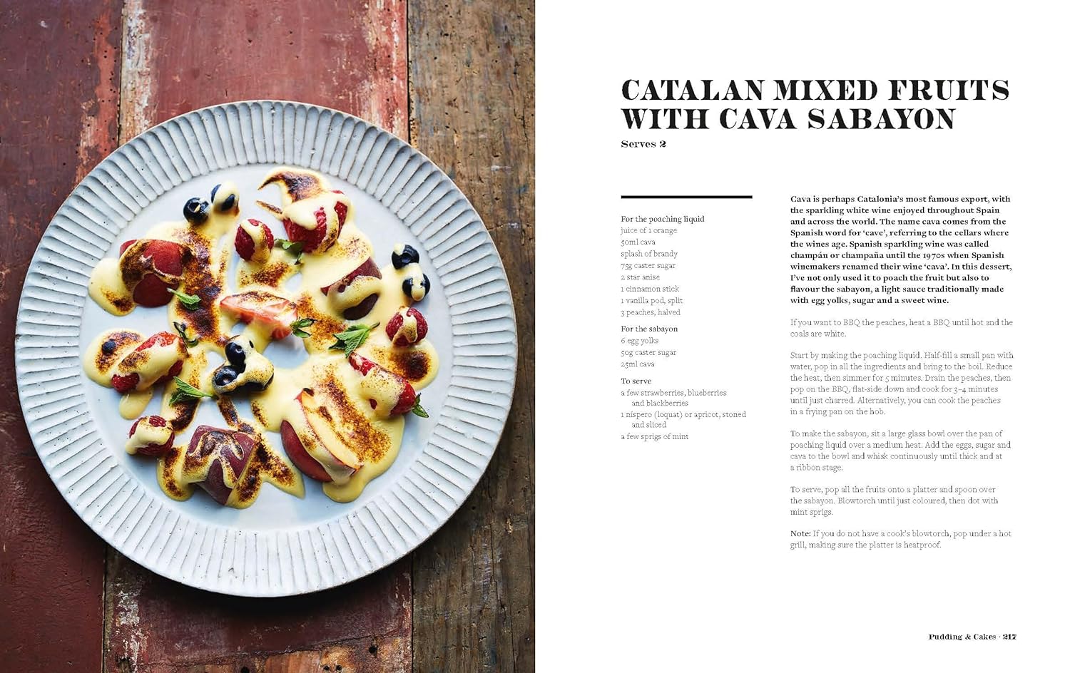 James Martin's Spanish Adventure hardback cookbook recipe page with step by step Spanish dish