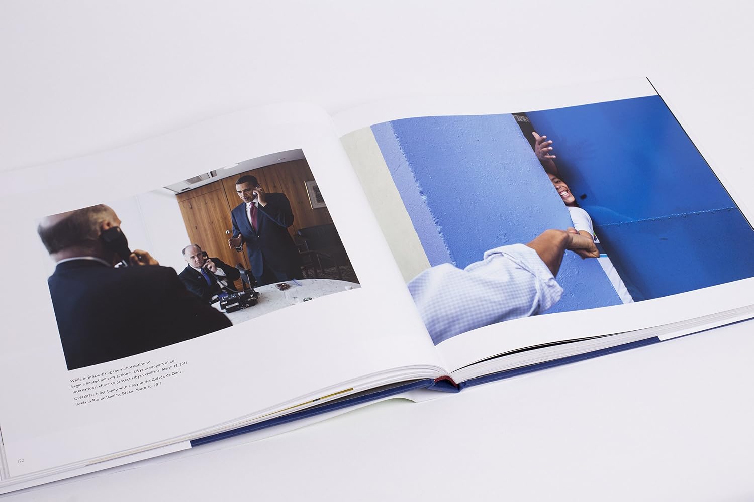 Photograph spread from Obama: An Intimate Portrait hardback by Pete Souza