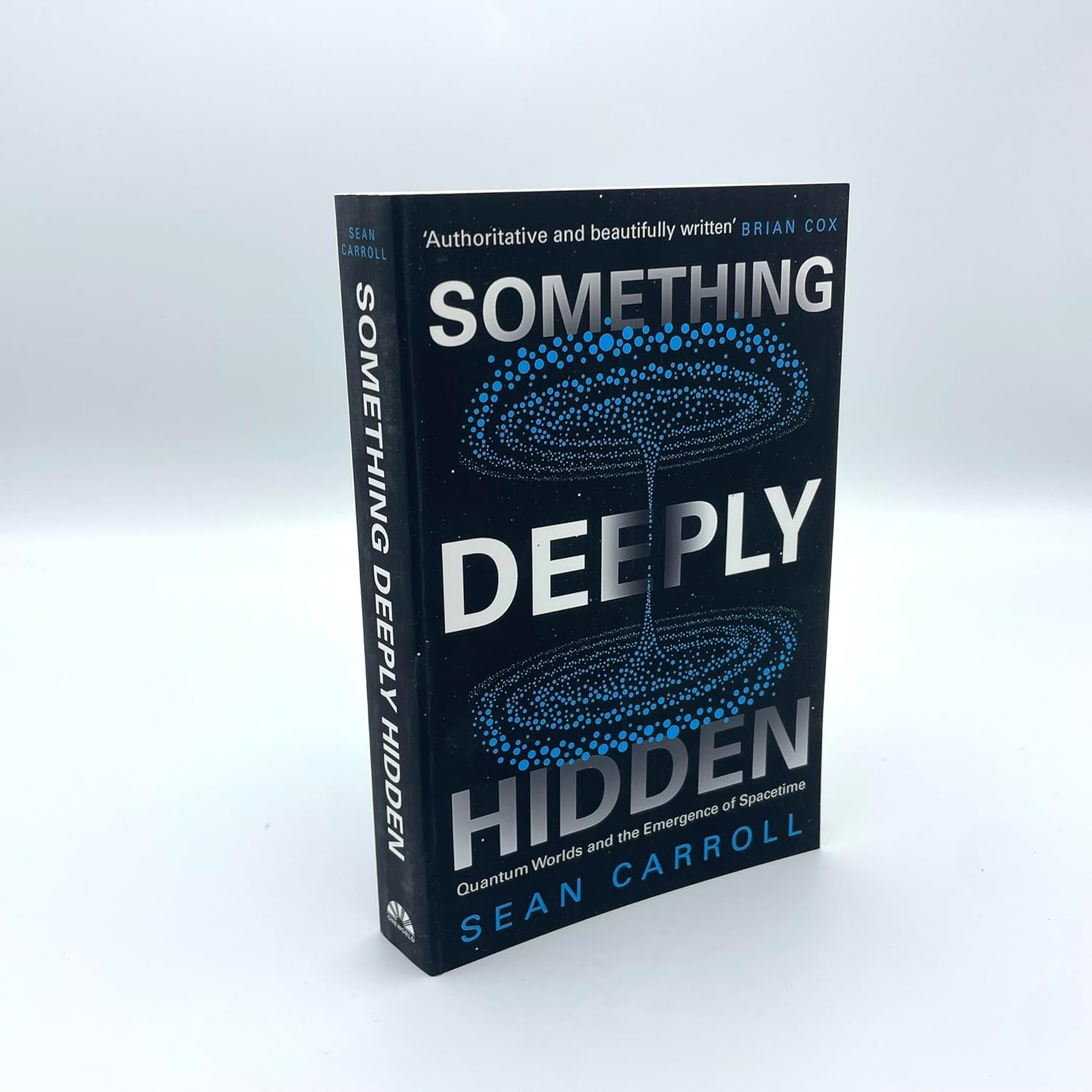 Something Deeply Hidden by Sean Carroll - close up detail of paperback quantum physics book