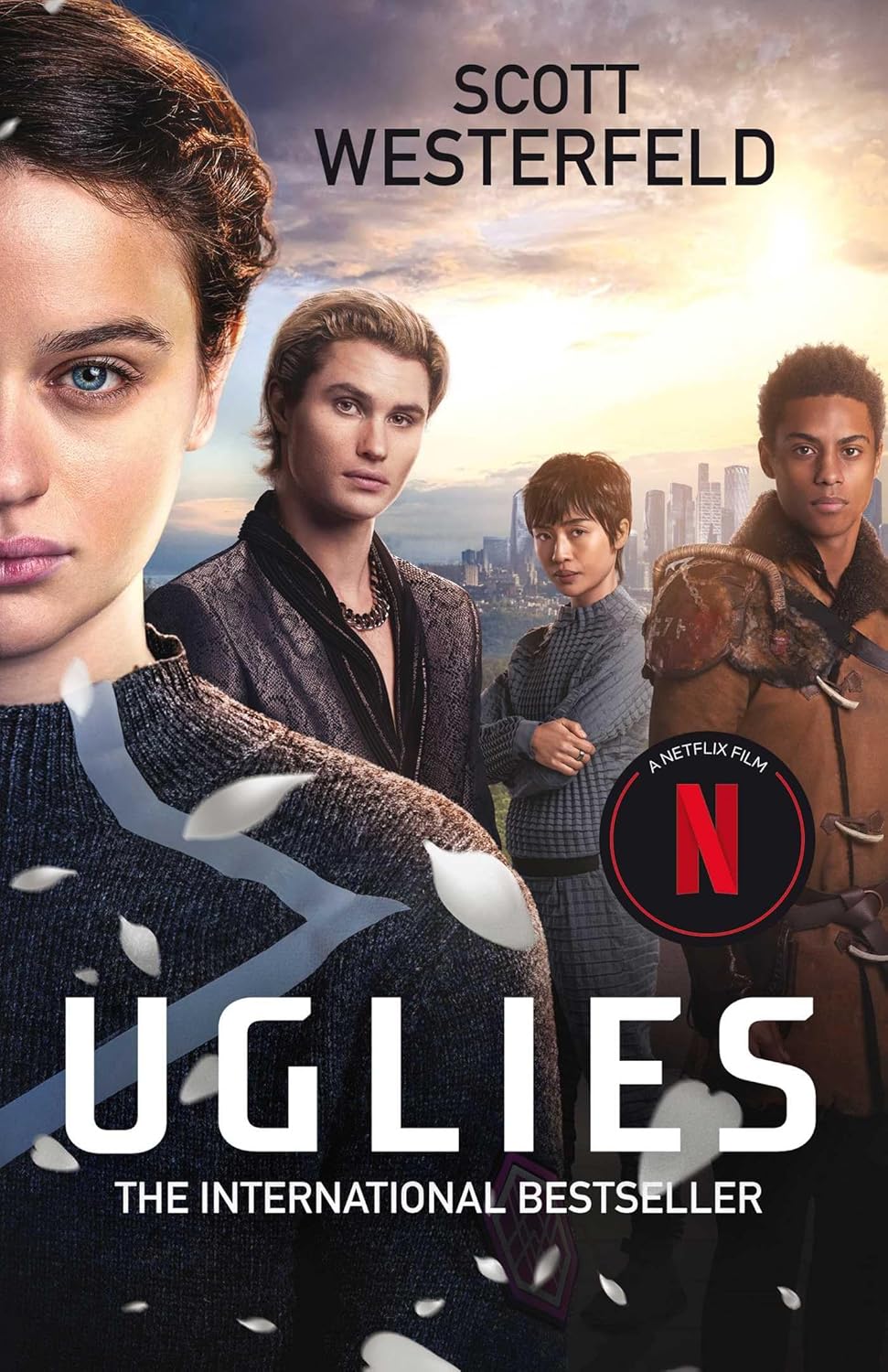 Uglies by Scott Westerfeld paperback book cover, Young Adult dystopian fiction, Now a No.1 Netflix film, ages 12+