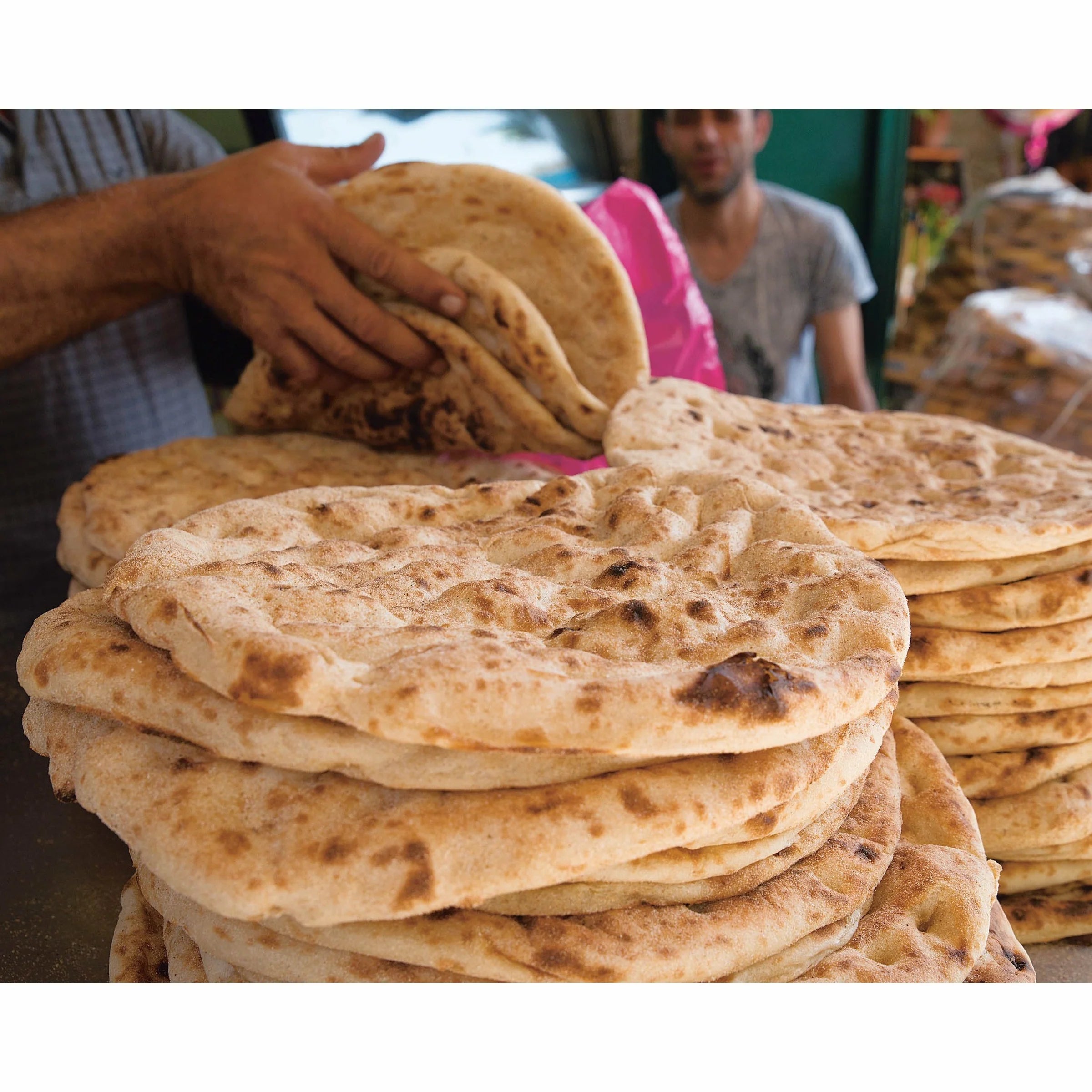 Zaitoun: Recipes and Stories from the Palestinian Kitchen by Yasmin Khan - hardback book spine and cover
